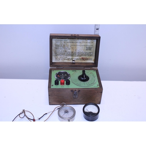 71 - A boxed electrical instrument tester and two volt meters