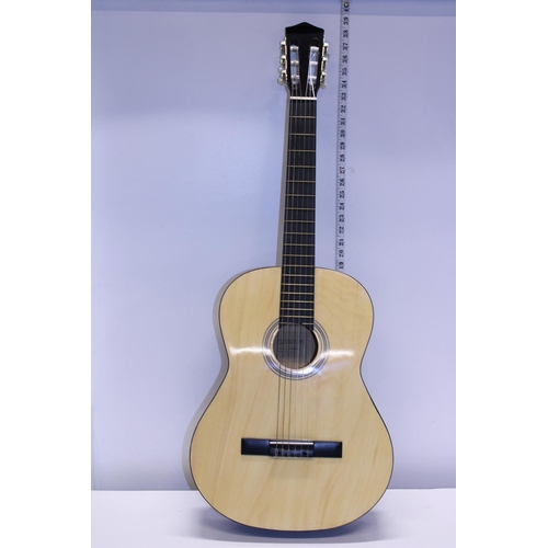 72 - A Elevation acoustic guitar. postage unavailable