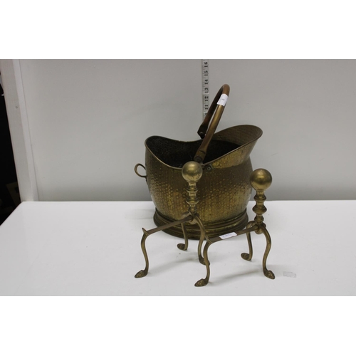 8 - A pair of brass firedogs and a brass coal bucket, shipping unavailable