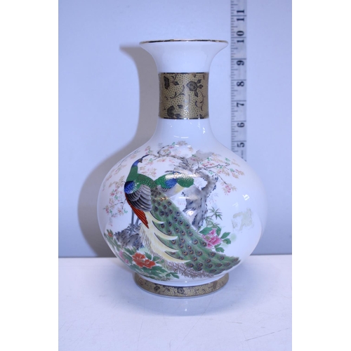 299 - A Japanese hand decorated glass vase