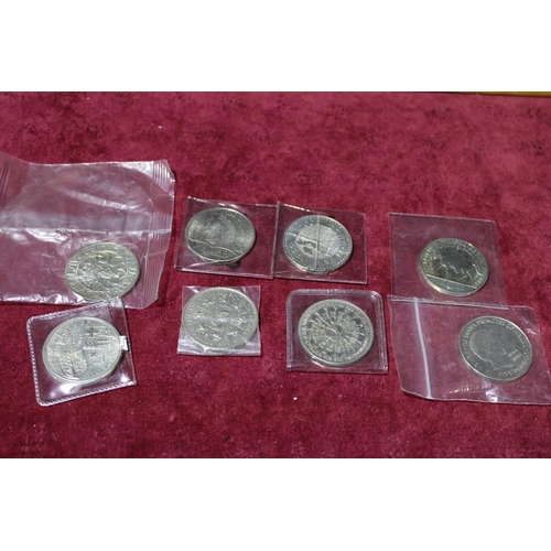 123 - Eight collectable £5 coins