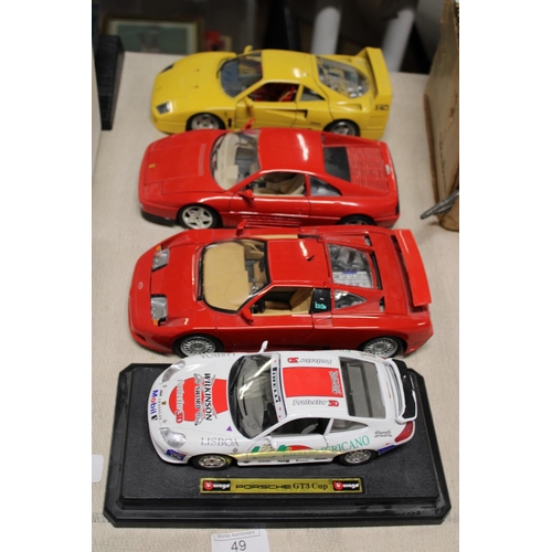 49 - Four assorted die-cast models