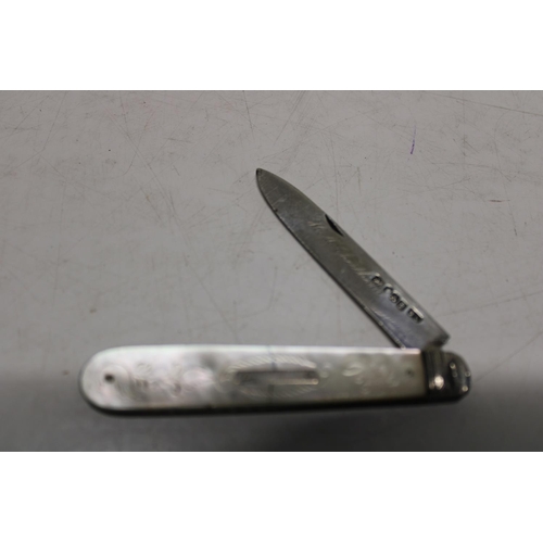 30 - A hallmarked silver and MOP handle fruit knife