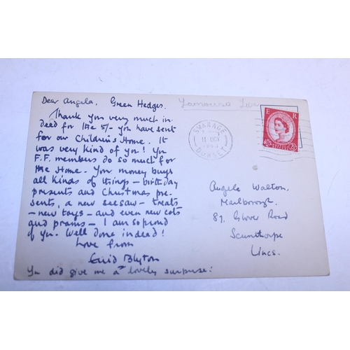 18D - A hand written and signed postcard by Enid Blyton, thanking the recipient for their donations 1963