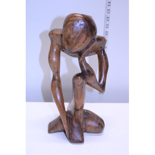 235 - A hand carved contemporary wooden figure