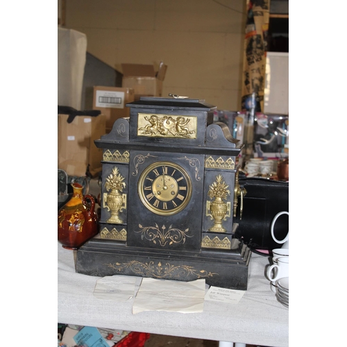 308 - A antique French 8 day striking marble mantel clock with visible escapement. Maker A D Mougin No 507... 