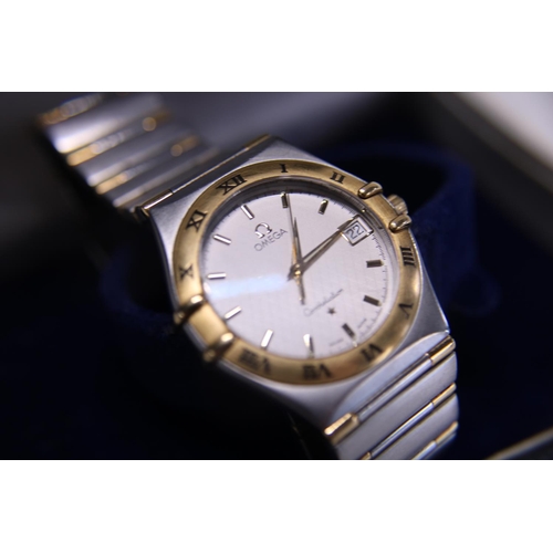 114 - A Omega 1980's constellation quartz movement men's wrist watch with 18ct gold bi-metal body and stra... 