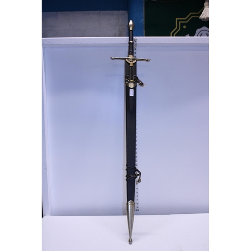 324 - A collectors Lord of the Rings Striders Ranger Sword, shipping unavailable