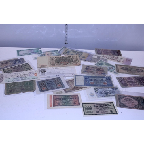 353 - A large selection of vintage world bank notes