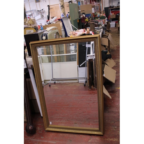 301 - A large gilt framed mirror. Postage unavailable