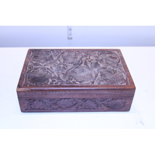 49 - A hand carved wooden box