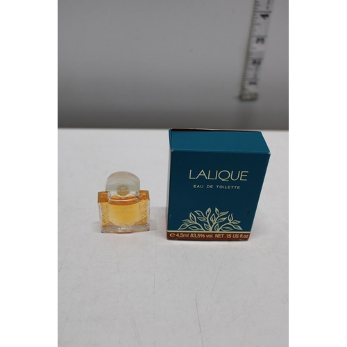 59 - A small bottle of Lalique perfume 4.5ml