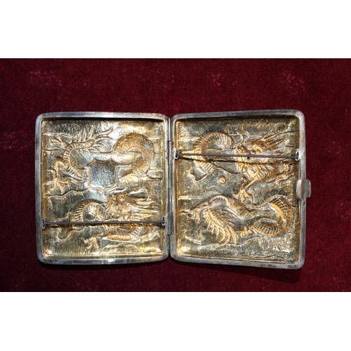 148 - A marked Chinese silver finely detailed cigarette case with gilt interior