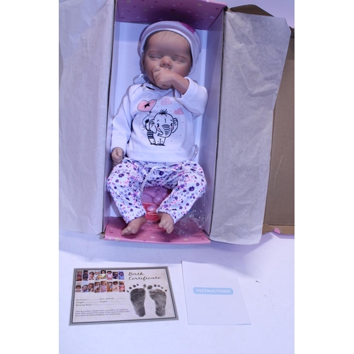 A boxed Reborn Happy Day Doll