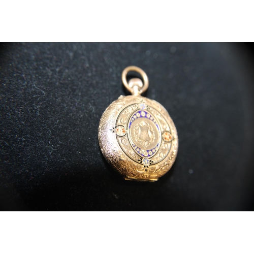 419 - A beautiful ladies 14ct gold pocket watch very finely decorated with enamel to the reverse, very ela... 