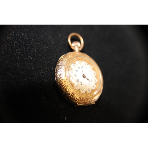 419 - A beautiful ladies 14ct gold pocket watch very finely decorated with enamel to the reverse, very ela... 