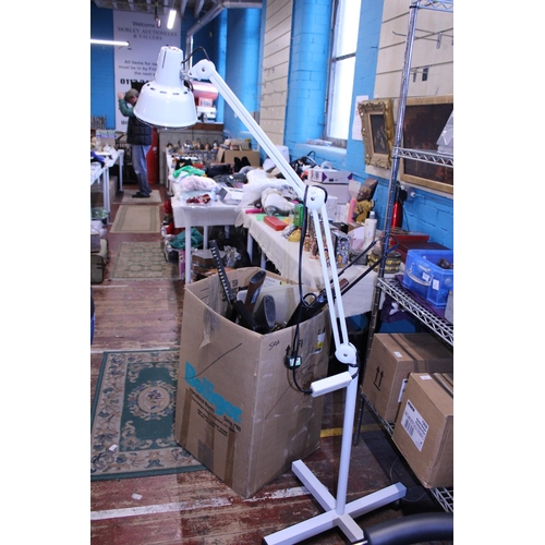 125 - A mobile floor standing inspection lamp, shipping unavailable