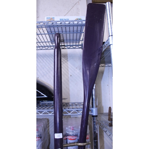 134 - A pair of boat oars, shipping unavailable