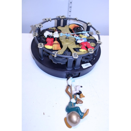 A Disney themed wall clock in working order. Shipping unavailable.