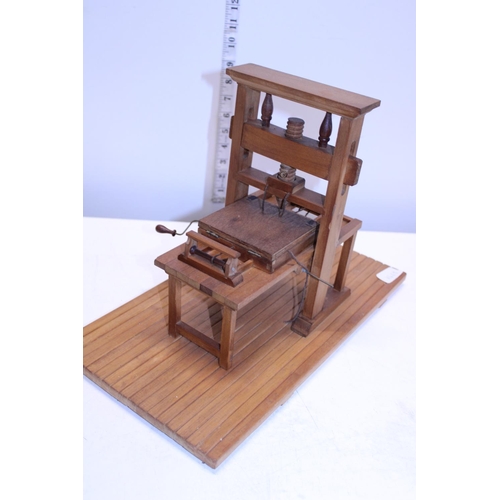 195 - A vintage handmade wooden printing press model