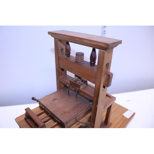 195 - A vintage handmade wooden printing press model