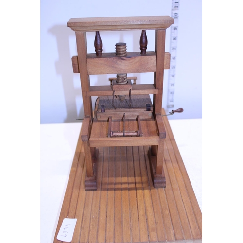 195 - A vintage handmade wooden printing press model