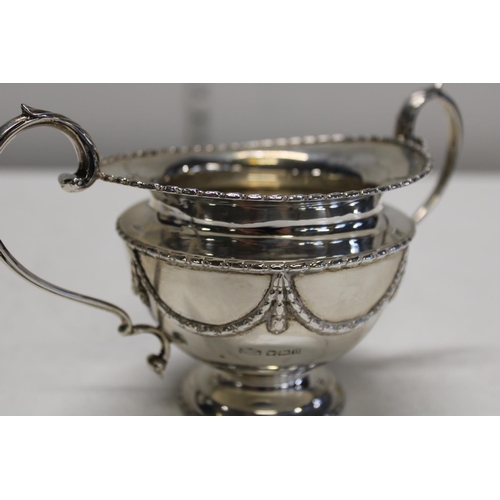 1 - A four piece sterling silver tea set; compromising of teapot, hot water jug, sugar and cream in a ci... 