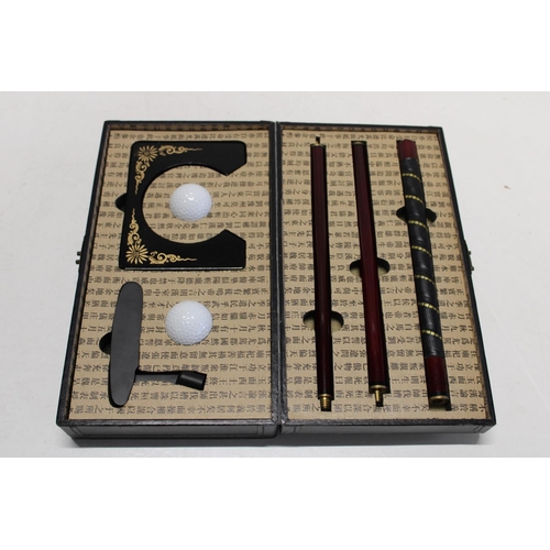 183 - A boxed golf putter gift set