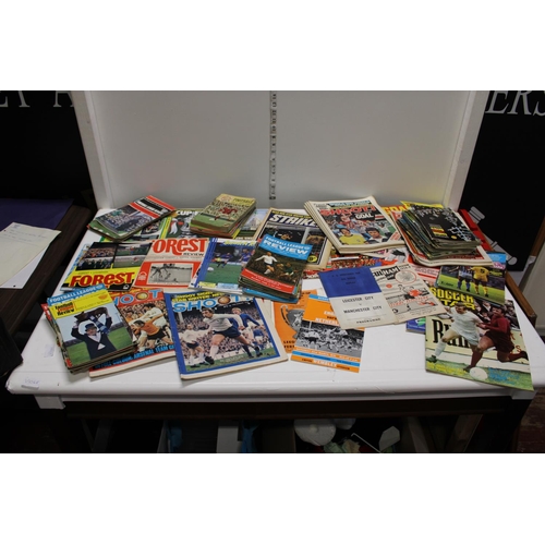 221 - A large selection of vintage football programmes and magazines including cup finals etc