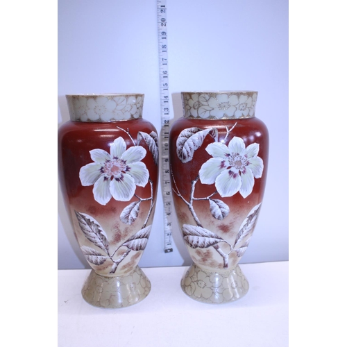 51 - A pair of vintage hand painted glass vases, shipping unavailable