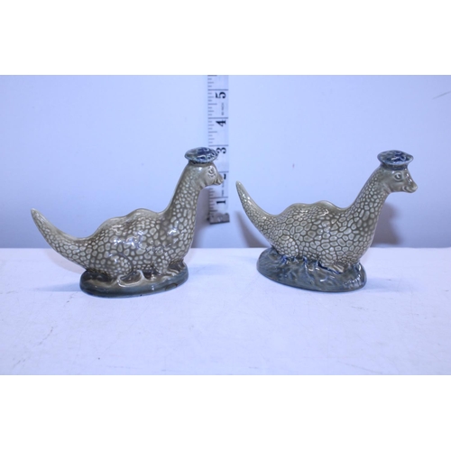 59 - A pair of Beswick Loch Ness Monster ceramic decanters