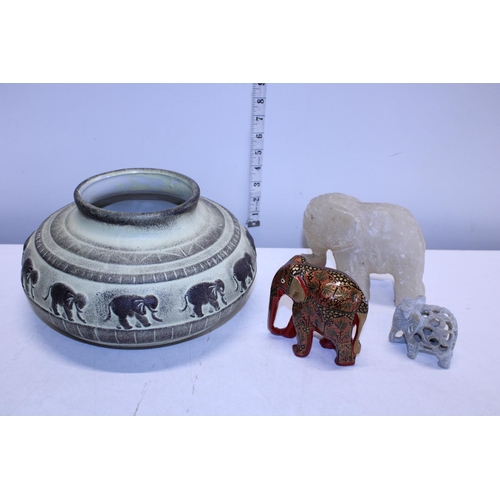 62 - A selection of elephant themed collectables