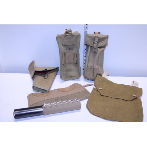 59 - A selection of reproduction military pouches etc