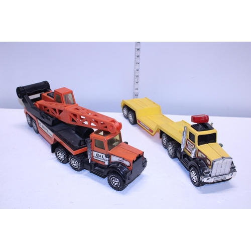 76 - Two vintage Buddy L truck models