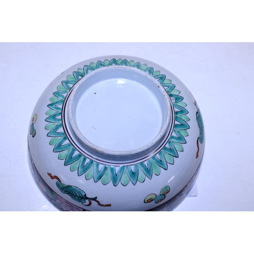 191 - A Chinese hand decorated bowl with repair to rim and chip to base. 25cm in diameter