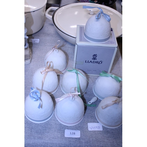 128 - A selection of collectable Lladro ceramic bells