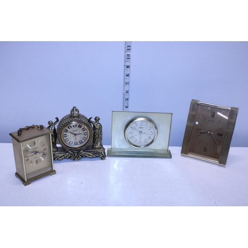 16 - Four assorted vintage time pieces.  Postage unavailable