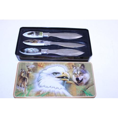 341 - A cased set of decorative knives