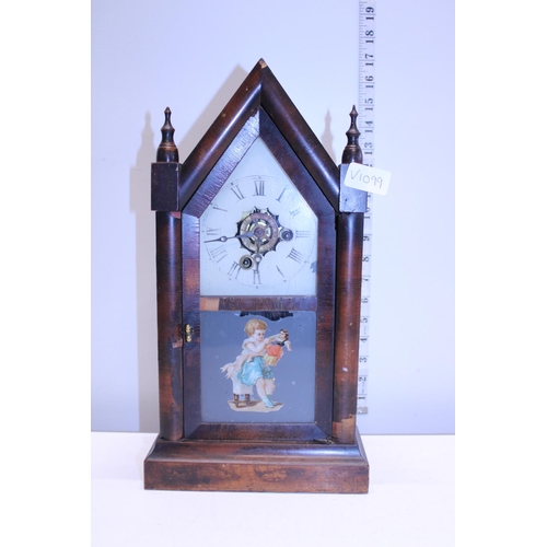 44 - A early 20th century Gothic style mantel clock.  a/f Postage unavailable