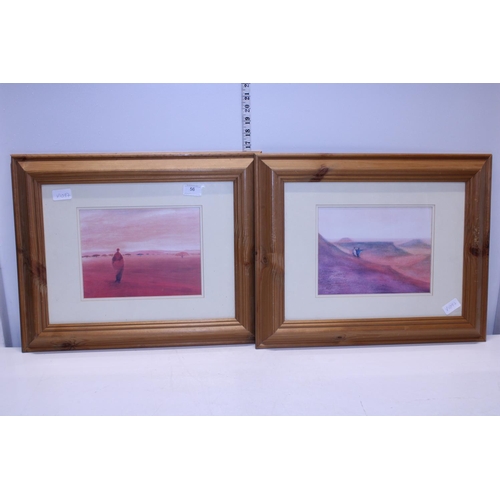 56 - Two framed prints (African scene).  Postage unavailable