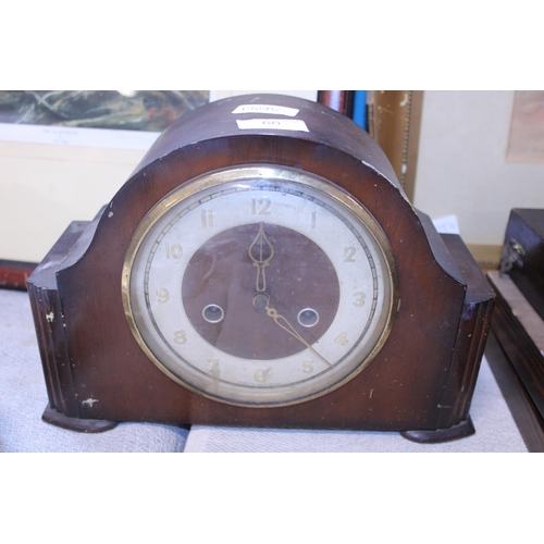 310 - A vintage wooden cased mantel clock