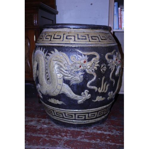 1 - A large heavy vintage Chinese ironstone storage jar with dragon detailing imported into Thailand, h7... 