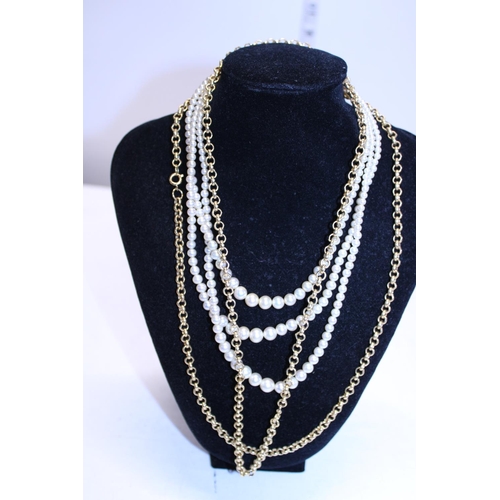 210 - A set of simulated Pearls and two Gold plated necklaces