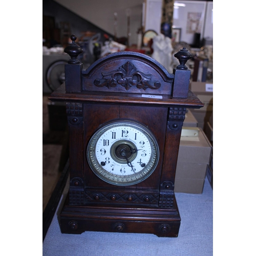 418 - A Fattorini and Sons wooden mantle clock with pendulum and key a/f