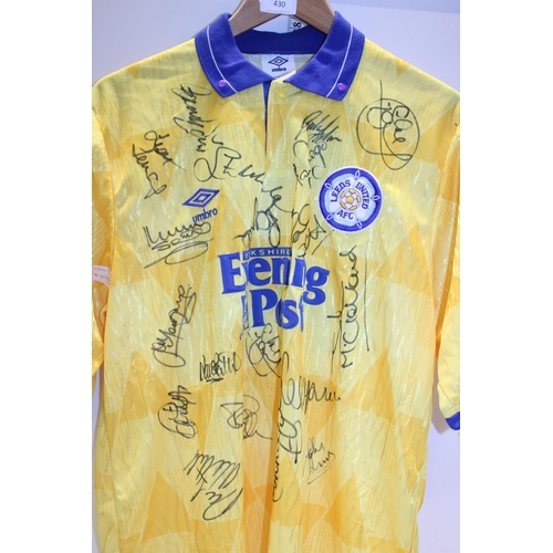 430 - A Leeds United Football shirt signed by the players from the late 1980's. From the collection of Ex ... 