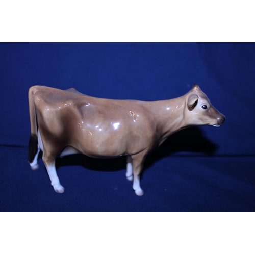 56 - A Beswick cow figurine