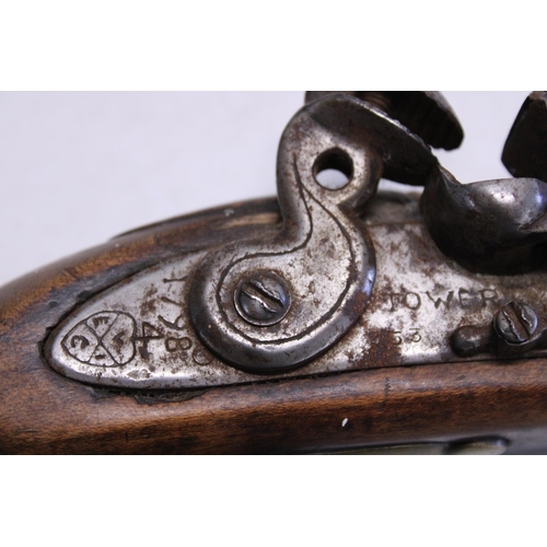 165 - A antique flintlock pistol marked Tower 1798 (slight damage to grip)