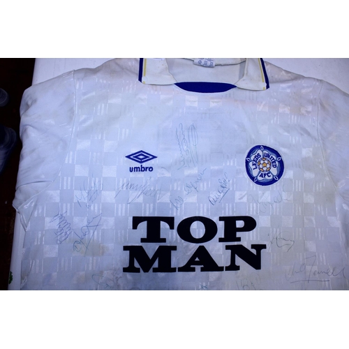 428 - A Leeds United Football shirt signed by the players from the late 1980's. From the collection of Ex ... 