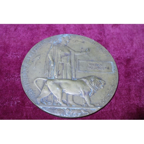 104 - A WW1 bronze death penny awarded William Rustage