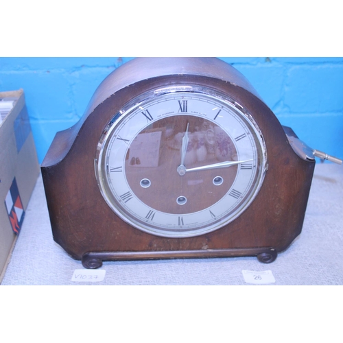 26 - A wooden cased 1930's mantle clock, shipping unavailable